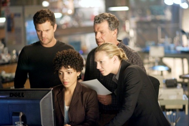 The Fringe team (L-R: Joshua Jackson, Jasika Nicole, John Noble and Anna Torv) uncovers details about the mysterious man known as The Observer in the FRINGE episode 