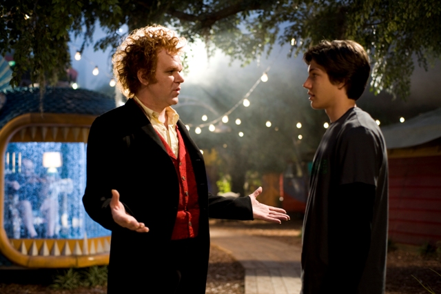 (L to R) Crepsley (JOHN C. REILLY) makes a curious proposal to Darren (CHRIS MASSOGLIA) in ?Cirque Du Freak: The Vampire?s Assistant?.  In the fantasy-adventure, one teen will vanish from the safety of a boring existence and fulfill his destiny in a place drawn from nightmares.