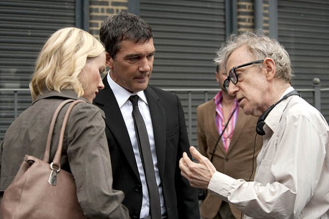 Naomi Watts and Antonio Banderas are directed by Woody Allen on the set of You Will Meet a Tall Dark Stranger.