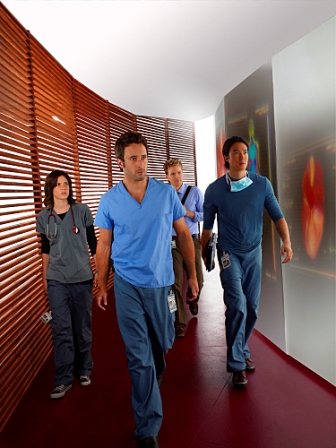 Dr. Andy Yablonski (Alex O'Loughlin, center), the highly-skilled workaholic lead organ transplant surgeon, Dr. Miranda Foster (Katherine Moennig), a surgical fellow with a rebellious streak, Dr. David Lee (Daniel Henney), a womanizing surgical resident and Ryan Abbott (Christopher J. Hanke), who despite possessing no prior medical experience, becomes the transplant coordinator on THREE RIVERS on Sunday, Oct. 4 (9:00-10:00 p.m. ET/PT) on the CBS Television Network.