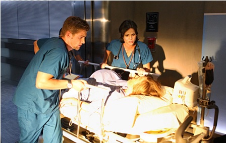 Dr. C (Mike Vogel) and Dr. Zambrano (Lana Parrilla, right) treat a trauma patient on 