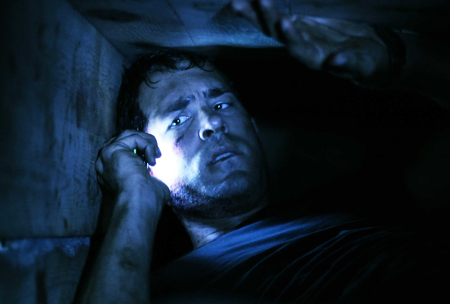 Down in the Depths: Ryan Reynolds as Paul Conroy in ‘Buried’