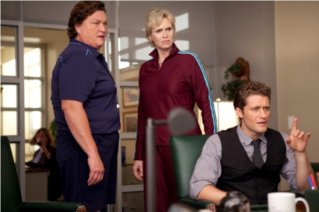 Coach Beiste (guest star Dot Jones, L), Will (Matthew Morrison, R) and Sue (Jane Lynch, C) argue in Principal Figgins' office in 