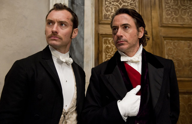Game is Afoot: Jude Law as Dr. Watson and Robert Downey Jr. as the Title Detective in ‘Sherlock Holmes: Game of Shadows’