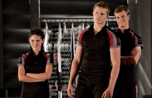 Isabelle Fuhrman (Clove) with Career Tributes Alexander Ludwig (Cato) and Jack Quaid (Marvel) in ‘The Hunger Games’