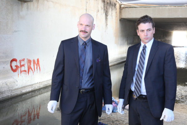 (l-r) Corey Stoll as Det. Tomas 