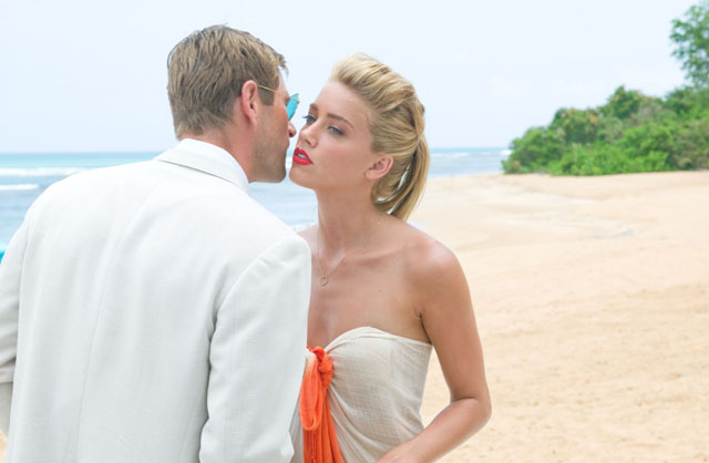 Aaron Echkart and Amber Heard in ’Rum Diary’