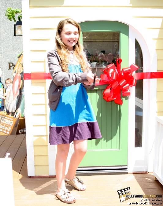 Abigail Breslin cuts the ribbon on June 17, 2008 at the Chicago opening of Kit's Home on Abbott Place by American Girl for the film Kit Kittredge: An American Girl