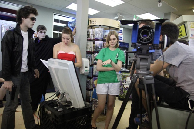 Emily Hagins (center) directs the cast and crew of her third feature, My Sucky Teen Romance.