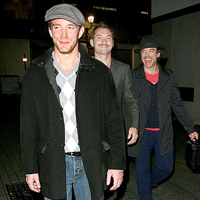 Guy Ritchie, Robert Downey Jr., and Jude Law.