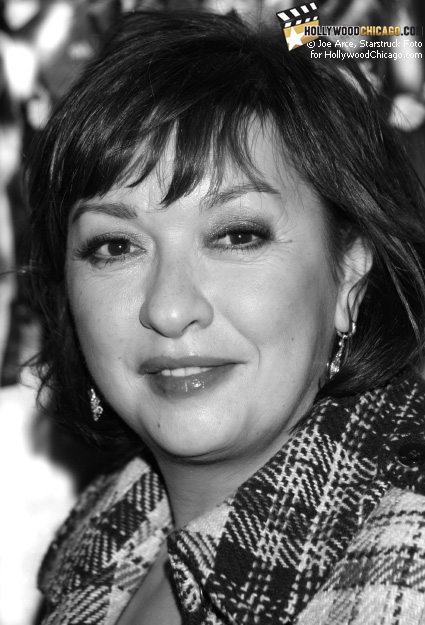 Elizabeth Pena poses for the HollywoodChicago.com lens in Chicago on Dec. 1, 2008 at the Music Box Theatre for the red-carpet premiere of Nothing Like the Holidays