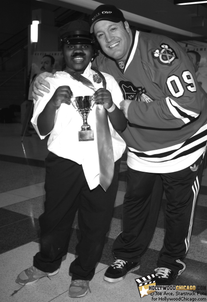 Chicago's 9-year-old Essence Francher is deputized and congratulated by Paul Blart: Mall Cop star Kevin James as the winner of the first-ever Deputy Mall Cop Tryouts for the Chicago Blackhawks children's charity on Jan. 13, 2009 at Chicago's United Center