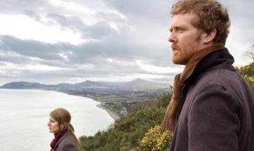 Glen Hansard and Marketa Irglova take in the coastline on their motorcycle trip