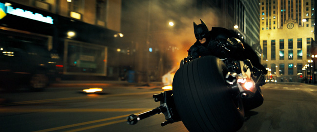 Christian Bale as Batman on his Batpod in The Dark Knight