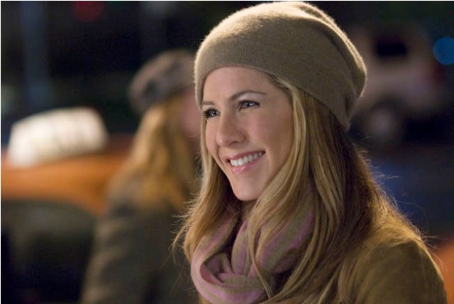 Jennifer Aniston phones in her trademark smile in Brandon Camp’s Love Happens.