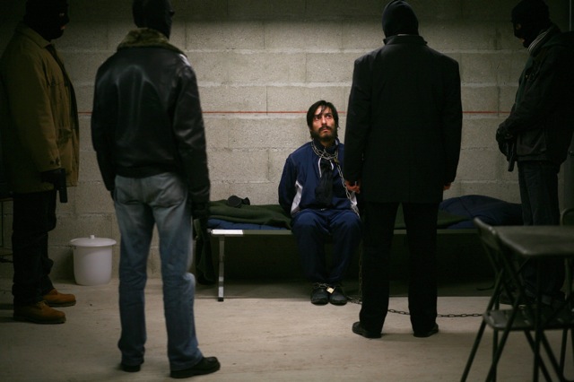 Yvan Attal is confronted by his kidnappers in Lucas Belvaux’s Rapt.