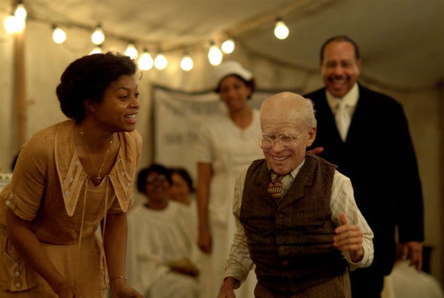 Taraji P. Henson (left) stars as Queenie and Brad Pitt (right) stars as Benjamin Button in The Curious Case of Benjamin Button