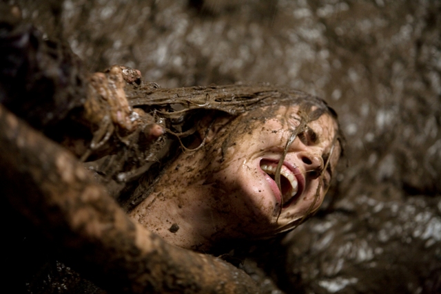 Christine Brown (Alison Lohman) is attacked while in the wet grave of her enemy.