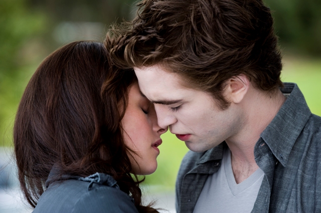 Kristen Stewart and Robert Pattinson star in The Twilight Saga: New Moon.