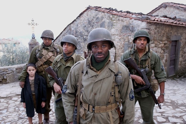 (L TO R)  Matteo Sciabordi, Omar Benson Miller (behind Matteo) Michael Ealy, Derek Luke (forefront), Laz Alonso.  This film chronicles the story of four black American soldiers stationed in Tuscany, Italy during Word War II.