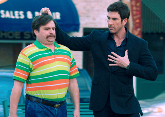 Zach Galifianakis (left) and Dylan McDermott in The Campaign